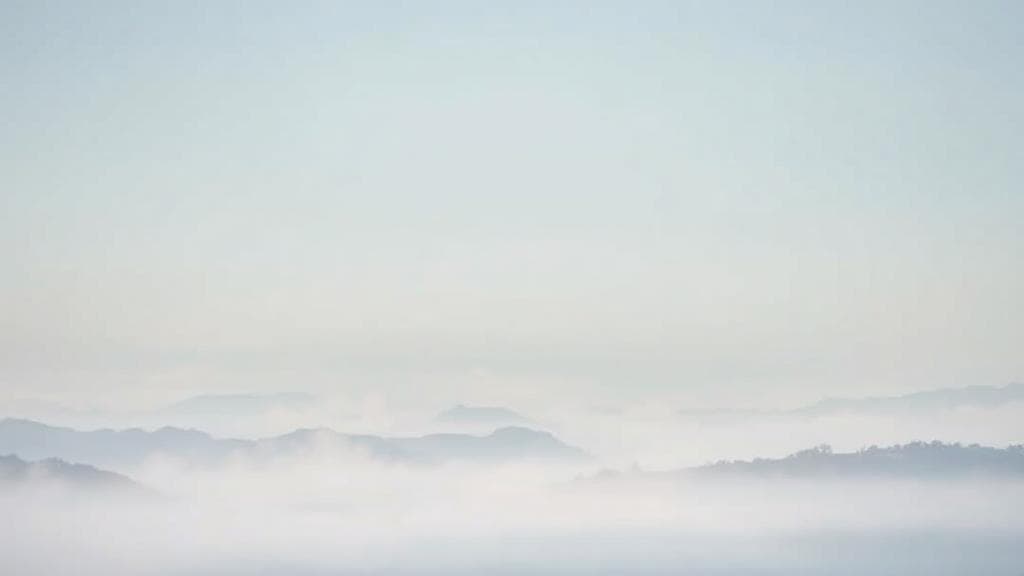 A calming image of a serene landscape with soft, muted colors, symbolizing tranquility and relief from anxiety.